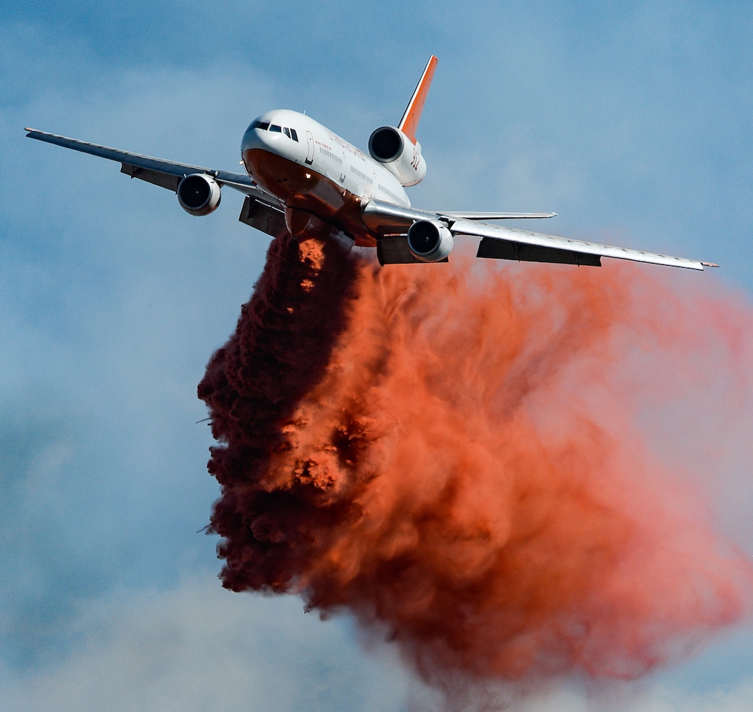 (Francisco Kjolseth  |  The Salt Lake Tribune)  Fire Crews direct a slurry bomber to unload its payload along the East Bountiful bench that grew to 150 acres early Friday morning, Aug. 30, 2019, and destroyed three homes. On Sept. 2, officials said the fire was 100% contained.