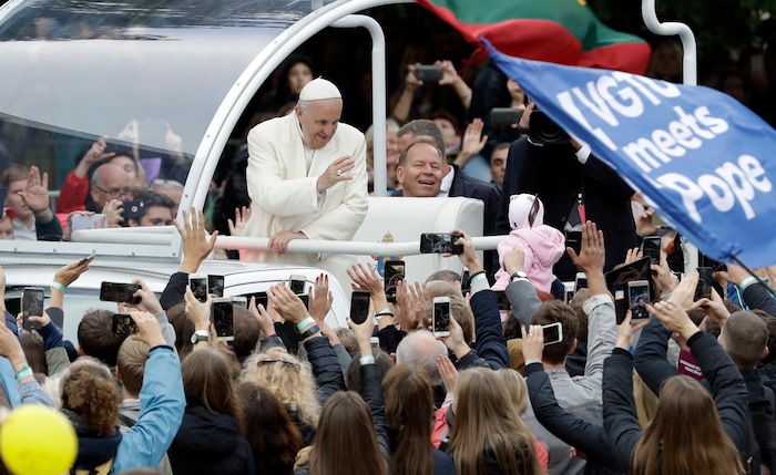 (Andrew Medichini  |  AP Photo)  Pope Francis greets faithful as he arrives for a meeting with youths in Vilnius, Lithuania, Saturday, Sept. 22, 2018. Pope Francis begins a four-day visit to the Baltics amid renewed alarm about Moscow's intentions in the region it has twice occupied.