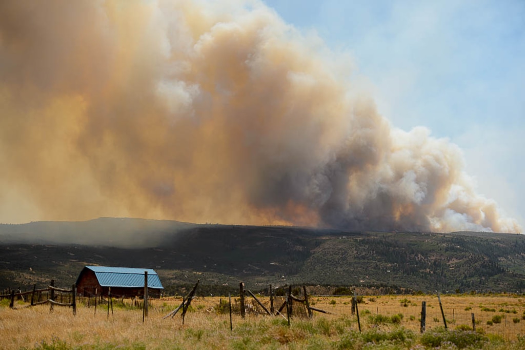 (Trent Nelson | The Salt Lake Tribune)The Dollar Ridge Fire seen from Fruitland in Duchesne County, Tuesday July 3, 2018.