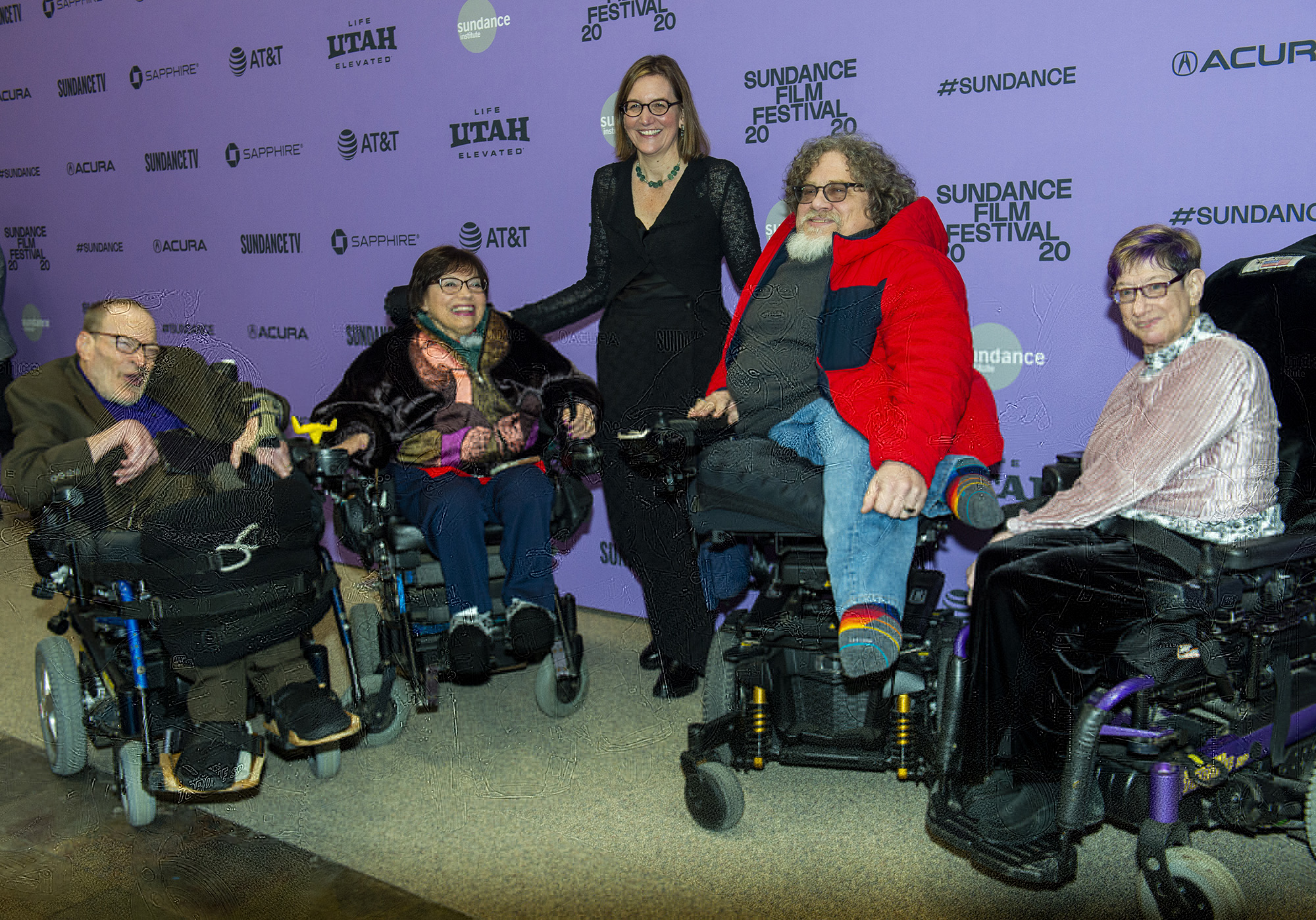 (Rick Egan  |  The Salt Lake Tribune)     Neil Jacobson, Judith Heuman, Nicole Newnhan, director/producer, Jim LeBrecht director/producer/subject, and Denise Jacobson, on the red carpet for the film "Crip Camp", the opening night film of the 2020 Sundance Film Festival, at the Eccles Theatre in Park City, Thursday, Jan. 23, 2020.