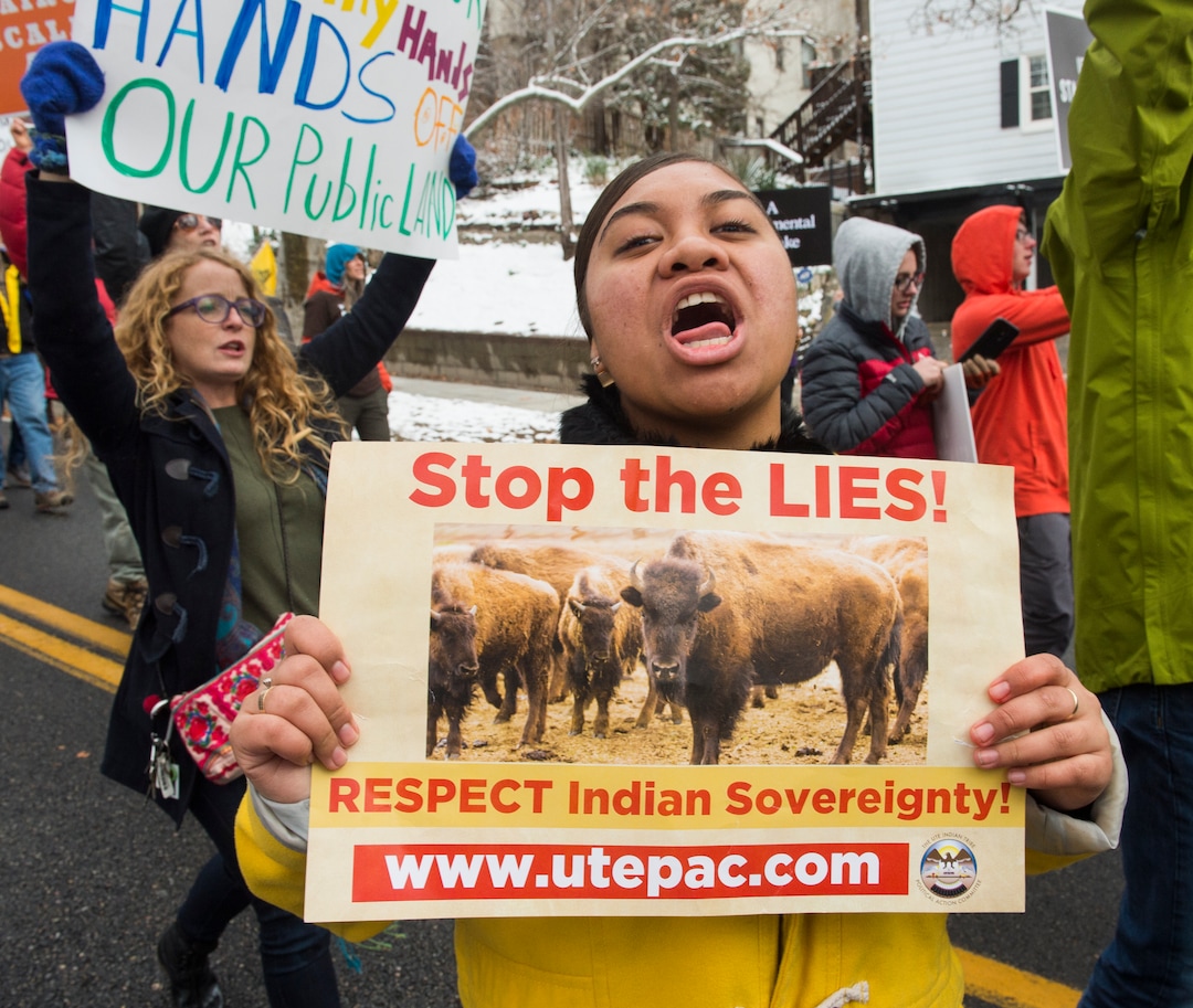 (Rick Egan  |  The Salt Lake Tribune)  Tefeleti Kfii chants as she marches down State Street among thousands of protesters, as they turn their backs and march down to the Federal Building, as President Trump speaks at the Utah State Capitol, during his visit to Salt Lake City, Monday, December 4, 2017.
