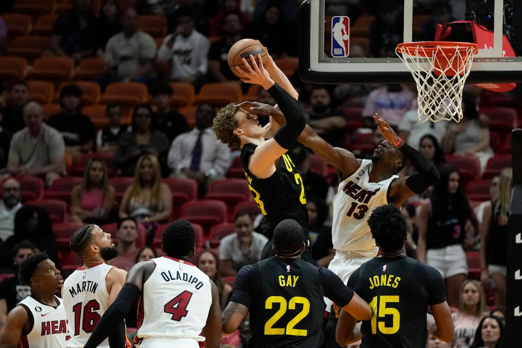 Miami Heat center Bam Adebayo fouls Utah Jazz forward Lauri Markkanen during the first half of an NBA basketball game, Monday, March 13, 2023, in Miami. (AP Photo/Rebecca Blackwell)
