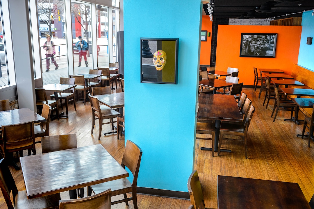 (Trent Nelson  |  The Salt Lake Tribune) An empty dining room at Alamexo Mexican Kitchen in Salt Lake City after the establishment announced the closure of dine in service on Monday, March 16, 2020.