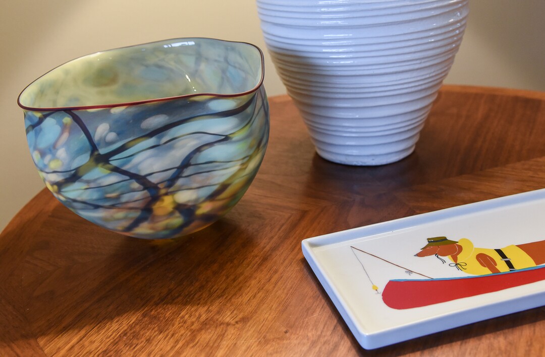 (Francisco Kjolseth  |  The Salt Lake Tribune)  Blair Tomten, who has been using the Kondo method to tidy up her home in Millcreek, started implementing the process four years ago after being inspired by the minimalism approach to tackling your stuff category by category as opposed to room by room. A blue glass bowl was one of the first pieces of art that she purchased for herself, now kept in a prominent place in her living room. 
