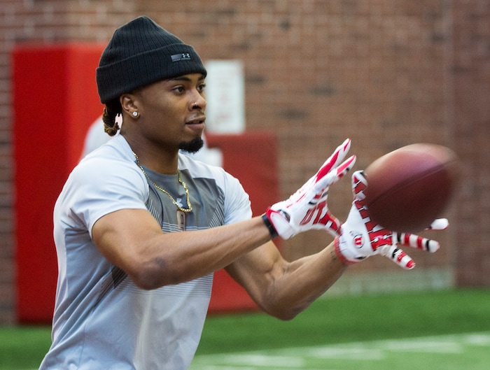 (Rick Egan  |  The Salt Lake Tribune)      Darren Carrington II,  catches a pass as he warms up for University of Utah's 2018 Pro Day for NFL scouts, at Spence Eccles Field House, Wednesday, March 28, 2018.