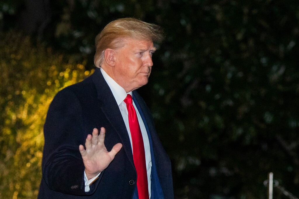 (Manuel Balce Ceneta | AP Photo) President Donald Trump waves as he leaves the White House, Monday, Jan. 20, 2020, in Washington to attend the annual economic forum in Davos, Switzerland.