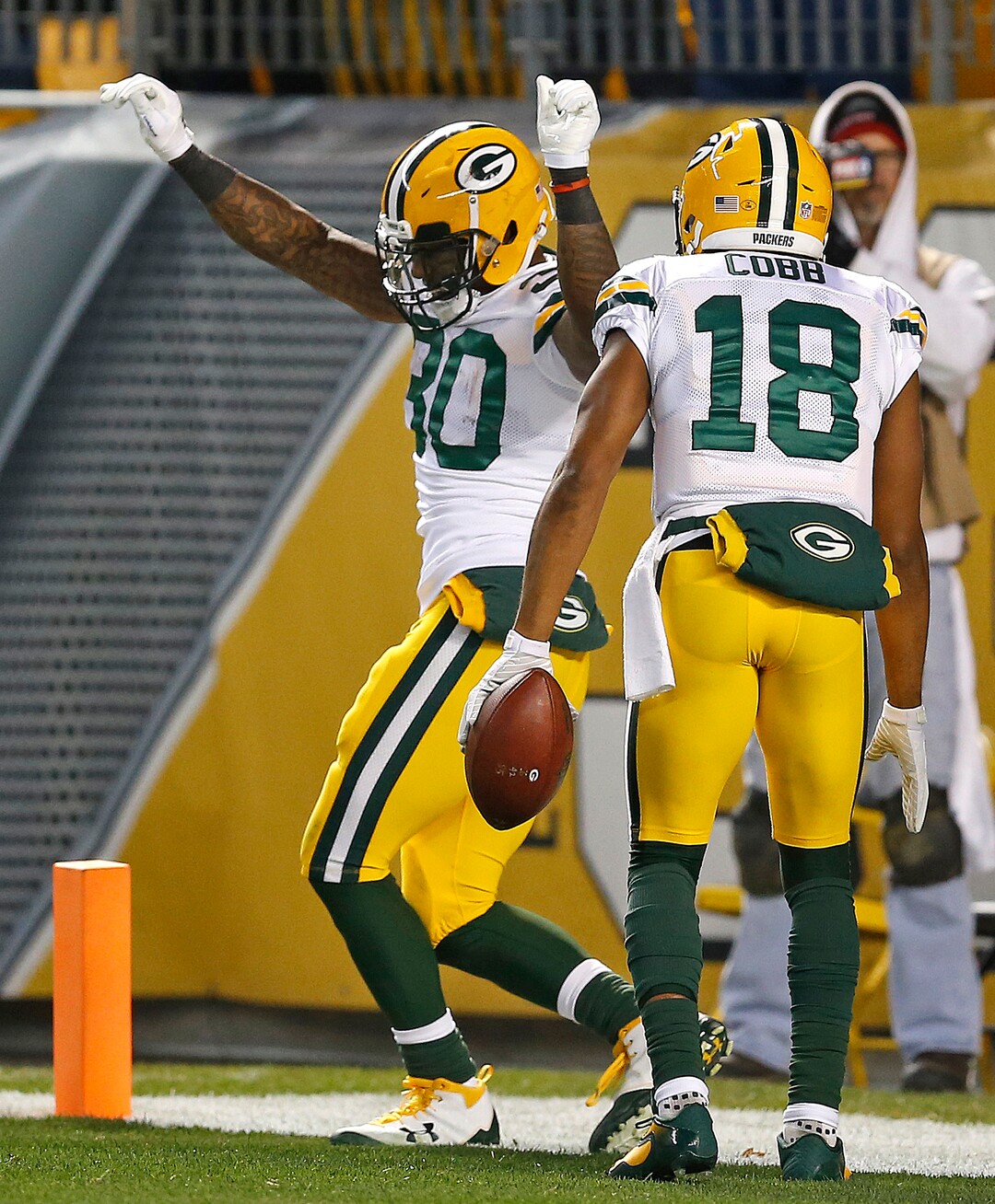 Green Bay Packers running back Jamaal Williams (30) celebrates after scoring during the first half of an NFL football game against the Pittsburgh Steelers in Pittsburgh, Sunday, Nov. 26, 2017. (AP Photo/Keith Srakocic)