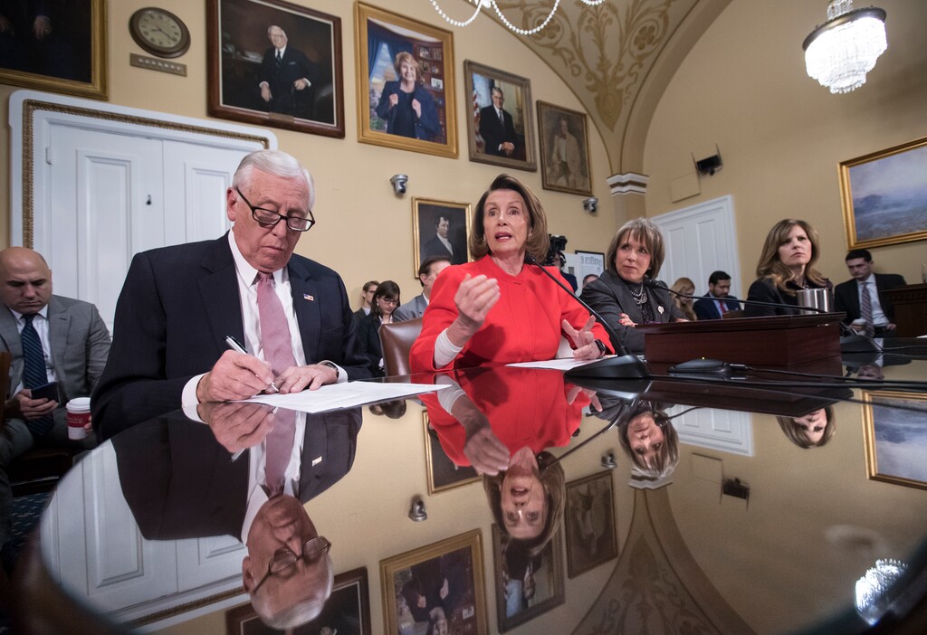 From left, Minority Whip Steny Hoyer, D-Md., House Minority Leader Nancy Pelosi, D-Calif., and Hispanic Caucus Chair Rep. Michelle Lujan Grisham, D-N.M., appear before the House Rules Committee to make an appeal to add protections to the government funding bill for immigrants brought to the U.S. illegally as children, know as "dreamers," on Capitol Hill, in Washington, Thursday, Dec. 21, 2017. With a government shutdown clock ticking toward a midnight Friday deadline, House Republican leaders struggled on Wednesday to unite the GOP rank and file behind a must-pass temporary spending bill. (AP Photo/J. Scott Applewhite)