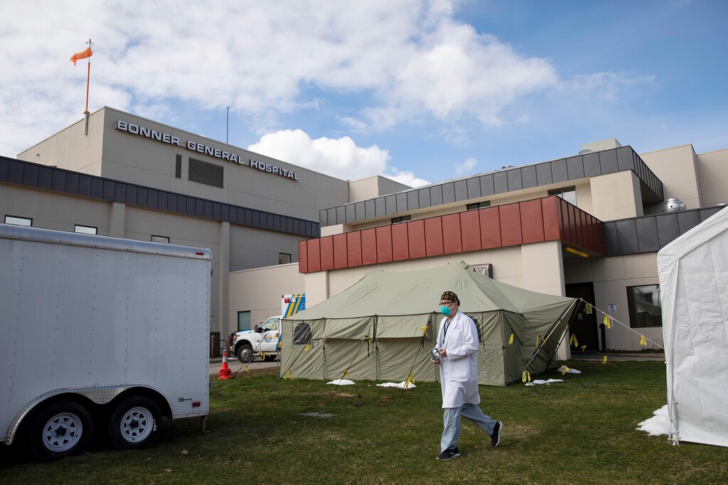 (Ruth Fremson | The New York Times) Outside the Bonner General Hospital in Sandpoint, Idaho, April 4, 2020, officials have erected two tents to help treat patients, should extra space be needed during the coronavirus pandemic. In a state with pockets of deep wariness about both big government and mainstream medicine, the sweeping restrictions aimed at containing the spread of the coronavirus have run into outright rebellion in some parts of Idaho, which is facing its own worrying spike in coronavirus cases.