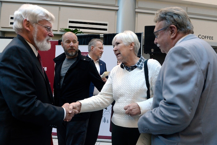 (Al Hartmann  |  The Salt Lake Tribune) 	
University of Utah President David Pershing, left, shakes hands with Gail Miller and husband Kim Wilson after announcement Nov. 13 that the University of Utah will receive a $5.3 million gift from Larry H. and Gail Miller Family Foundation to fight diabetes, called "Driving Out Diabetes:  A Larry H. Miller Wellness Initiative."