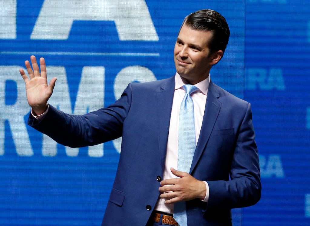 (Sue Ogrocki | The Associated Press) In this May 4, 2018, file photo, Donald Trump Jr., waves from the stage at the National Rifle Association in Dallas.