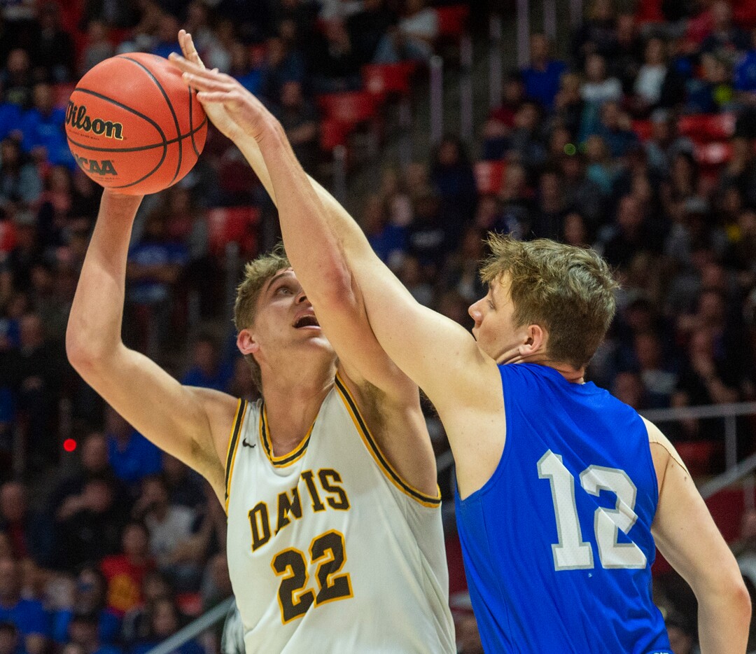 (Rick Egan  |  The Salt Lake Tribune)    Davis High forward Jax Pearce (22) shoots as Fremont Silverwolves Mitch Stratford (12) defends, in the 6A championship game at the Jon M. Huntsman Center, Saturday Feb. 29, 2020