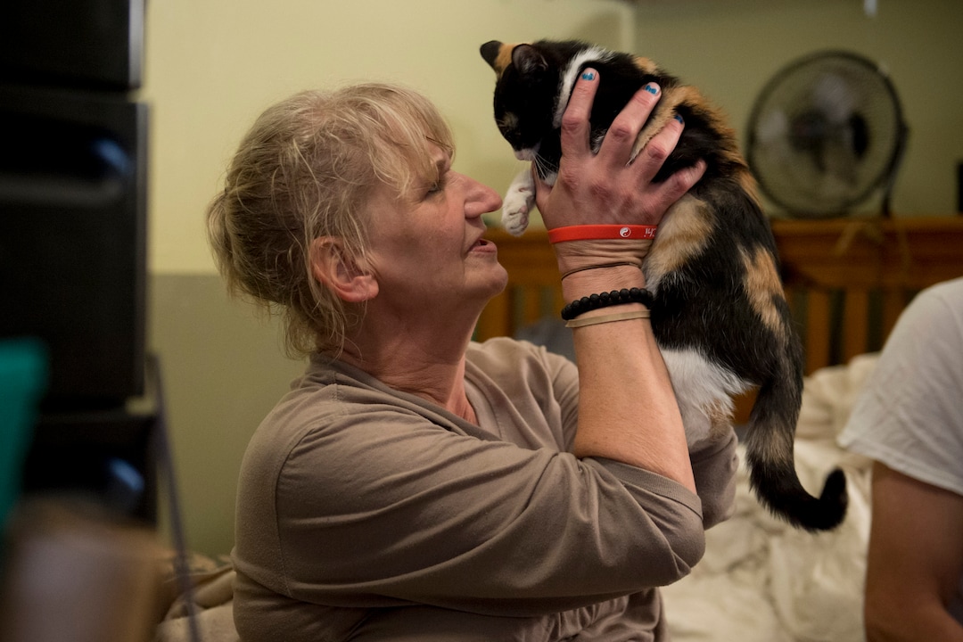 (Jeremy Harmon  |  The Salt Lake Tribune) Katherine Barrett plays with a kitten at her apartment in Salt Lake City on Monday, August 26, 2019.