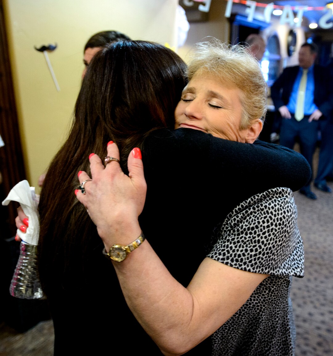 (Steve Griffin  |  The Salt Lake Tribune) INN Between resident Linda Lemieux, right, gets a hug from Janet Jackson, public relations volunteer for the Inn Between, following a news conference announcing a new home for INN Between, a hospice for the homeless facility in Salt Lake City. The INN Between will be moving into an existing assisted living facility on 1300 south near 1200 east where the news conference was held in Salt Lake City Thursday May 3, 2018.