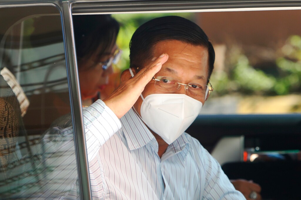 FILE - In this Nov. 8, 2020, file photo, Myanmar military Commander-in-Chief Senior Gen. Min Aung Hlaing leaves a polling station after voting in Naypyitaw, Myanmar. A military coup was taking place in Myanmar early Monday, Feb. 1, 2021 and State Counsellor Aung San Suu Kyi was detained under house arrest, reports said, as communications were cut to the capital. (AP Photo/Aung Shine Oo, File)