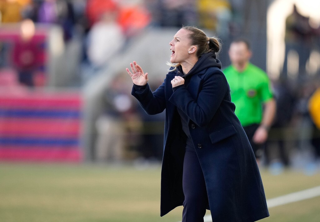 (Francisco Kjolseth  |  The Salt Lake Tribune) Utah Royals head coach Amy Rodriguez yells out instructions to her players as they take on the Chicago Red Stars during their season opener at America First Field Saturday, March 16, 2024, in Sandy, Utah.