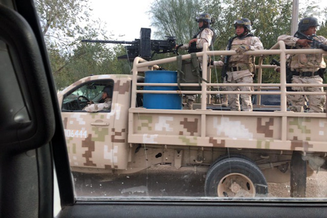 (Trent Nelson |  The Salt Lake Tribune) Mexican military escorts family members of those slain in a recent attack in Sonora through the area as they make their way to funerals on Wednesday, November 6, 2019.