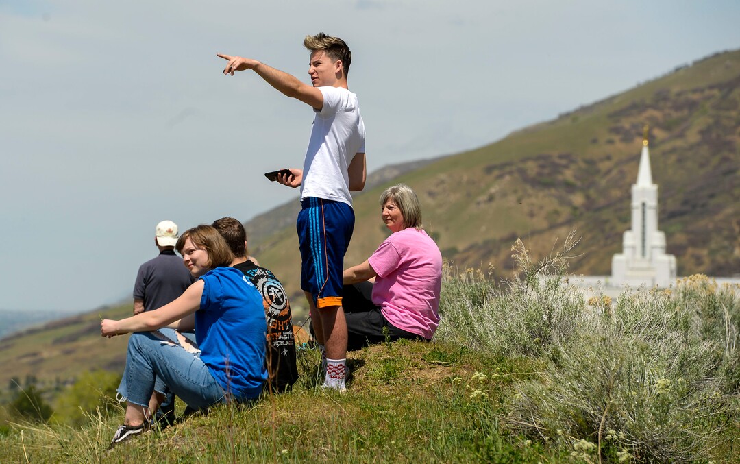 (Leah Hogsten  |  The Salt Lake Tribune) Onlookers lined Bountiful Blvd. to get a glimpse of the F-35Õs passing through Davis County.  In support of the healthcare workers, first responders and essential personnel on the front lines of the fight against COVID-19, Hill Air Force BaseÕs F-35 pilots from the Demo Team and the 388th Fighter Wing flew over the state, April 30, 2020.