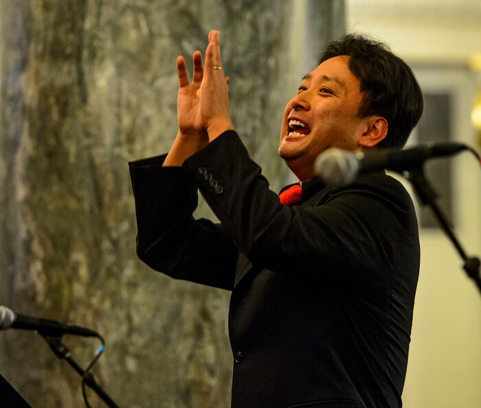 (Steve Griffin  |  The Salt Lake Tribune)  Masa Fukuda directs the One Voice Children's Choir during a concert at the Joseph Smith Memorial Building in Salt Lake City Friday December 8, 2017.