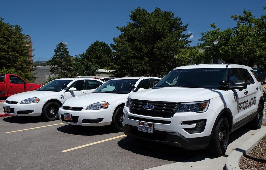(Francisco Kjolseth  |  The Salt Lake Tribune)  Police cars sit in the parking lot of the University of Utah police department on Wed., June 5, 2019.