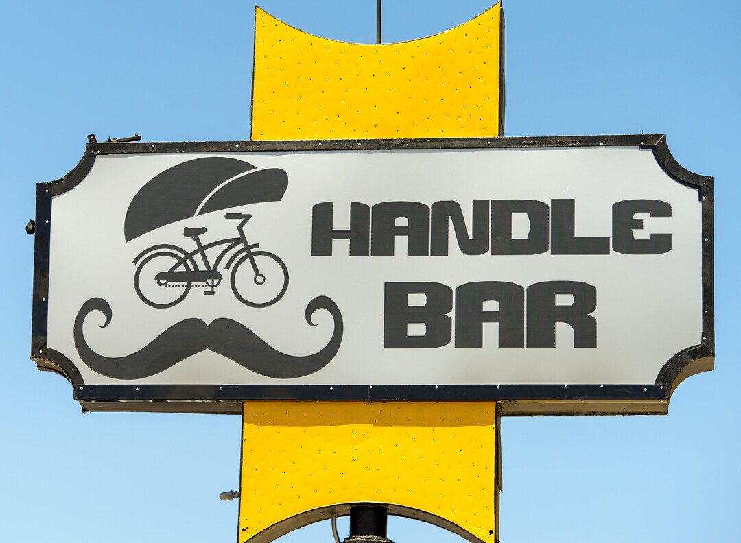 (Leah Hogsten|The Salt Lake Tribune) The new sign at HandleBar, showcases its cycling and mustache theme.