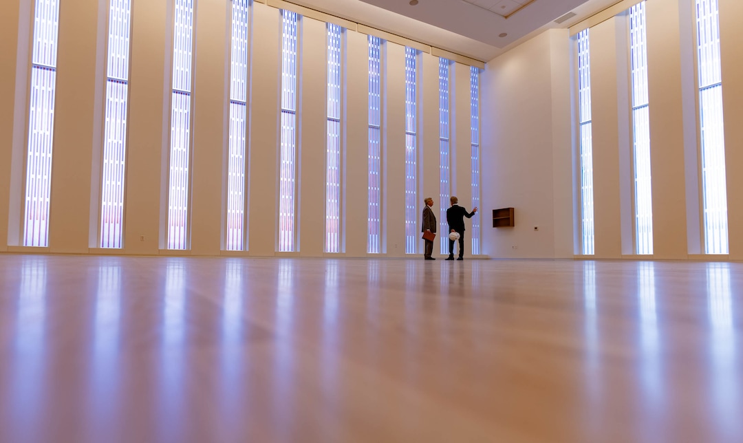 (Francisco Kjolseth | The Salt Lake Tribune) People tour the main chapel in the new 95 State meetinghouse of The Church of Jesus Christ of Latter-day Saints on Friday, April 8, 2022, where light filters through 100,000 pieces of glass that were laminated together. 