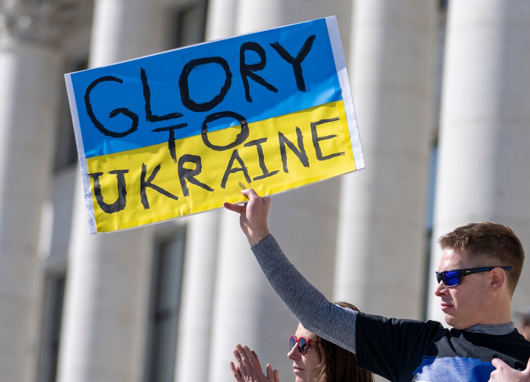 (Rick Egan | The Salt Lake Tribune) Jamie and Derrek Larson join hundreds of protesters, during a rally against Russia's invasion of Ukraine, organized by the Utah Ukrainian association, on Saturday, March 12, 2022.