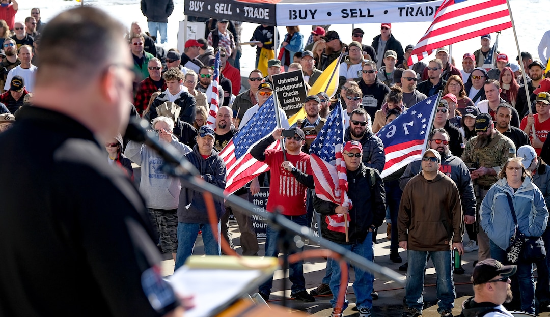 (Francisco Kjolseth  |  The Salt Lake Tribune) Hundreds of pro gun proponents gather at the Utah Capitol in Salt Lake City on Saturday, Feb. 8, 2020, as Clark Aposhian, Chairman of the Utah Shooting Sports Councilin, speaks at the podium in response to recent proposals from legislators, including red-flag laws, universal background checks and the elimination of private transfers.