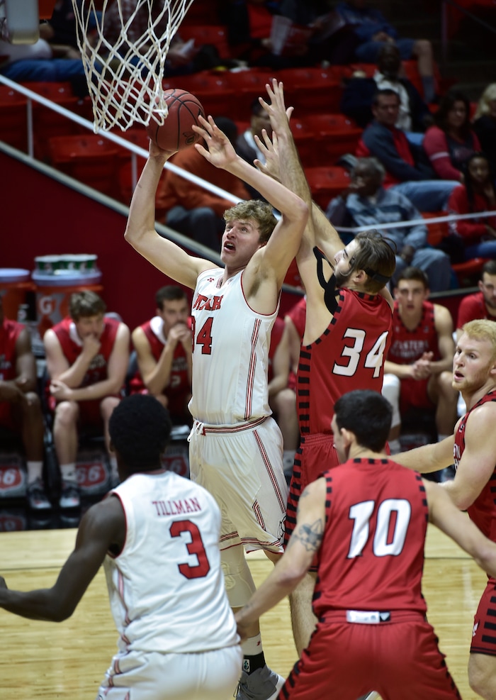 (Scott Sommerdorf   |  The Salt Lake Tribune)   Utah's Jatce Johnson scores during first half play. Utah defeated Eastern Washington 85-69, Friday, November 24, 2017. 