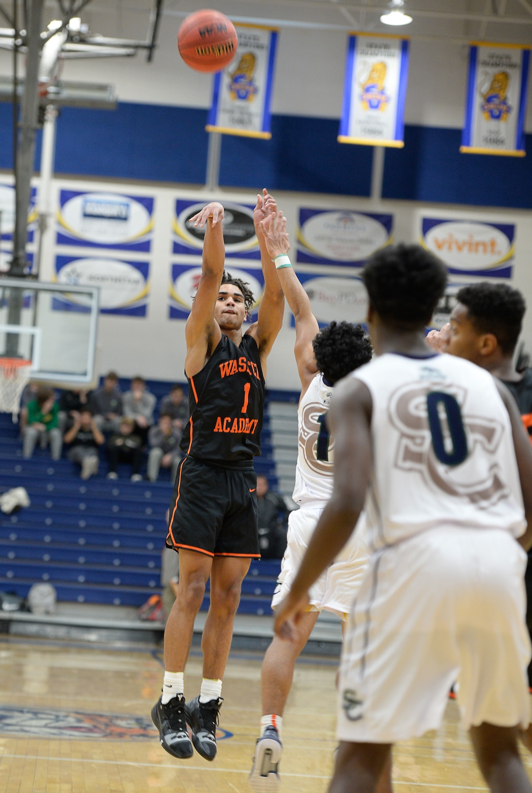 (Francisco Kjolseth  |  The Salt Lake Tribune)  Tre Williams of Wasatch Academy lets a shot fly over South County High during a recent tournament at Orem High. The team is currently ranked No. 2 by MaxPreps. 