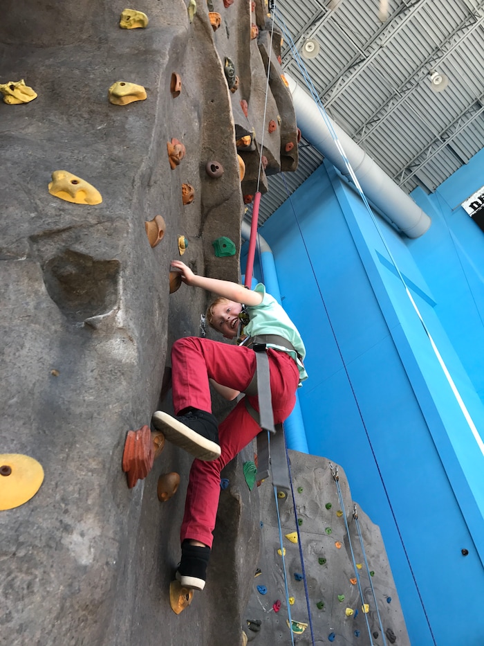 (Heather May | Special to The Tribune) Luke, 8, climbs at iRock Utah in Ogden.