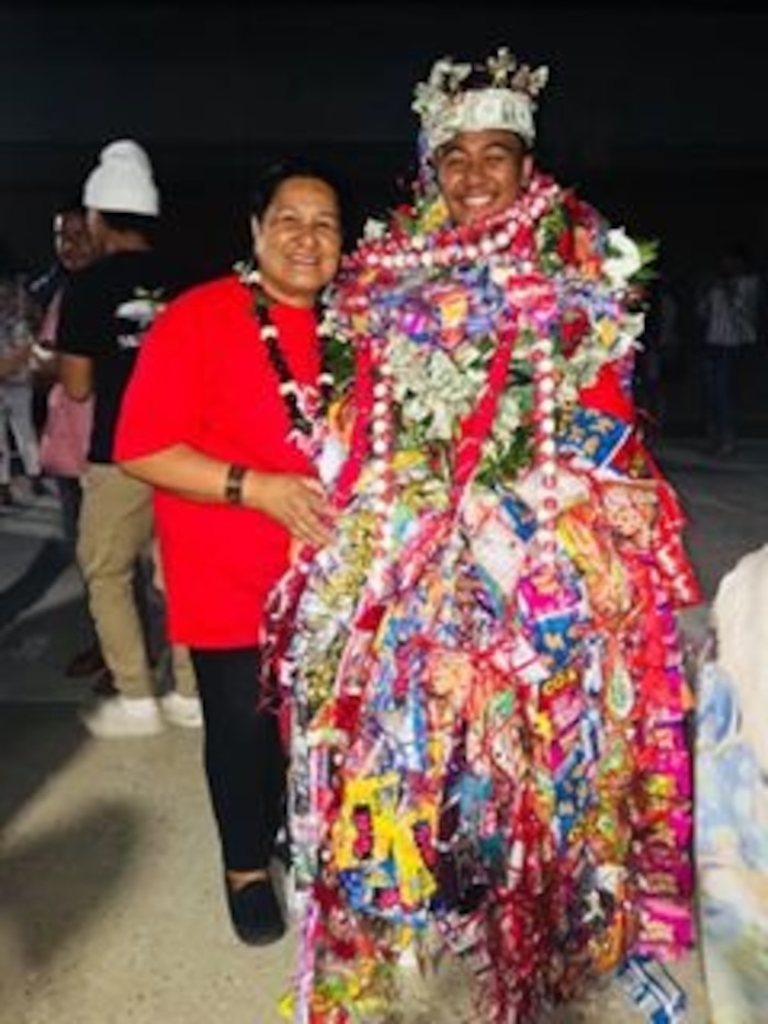(Courtesy of M. Vida Hafoka) Taavili PO Hafoka graduated from East High School in Salt Lake City on Wednesday, June 6, 2018. He has South Pacific heritage but was banned from wearing leis during his ceremony at the Huntsman Center. Pacific Islander students, when allowed, typically wear one or two fresh leis during their graduation to honor their heritage. Relatives then pile more on after the ceremony, in celebration.