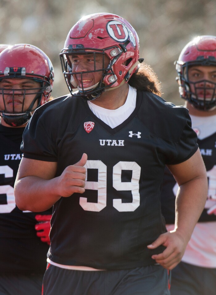 (Rick Egan  |  The Salt Lake Tribune)    Utah defensive lineman Leki Fotu (99), works out with the team, on the first day of Spring practice, Monday, March 5, 2018.



