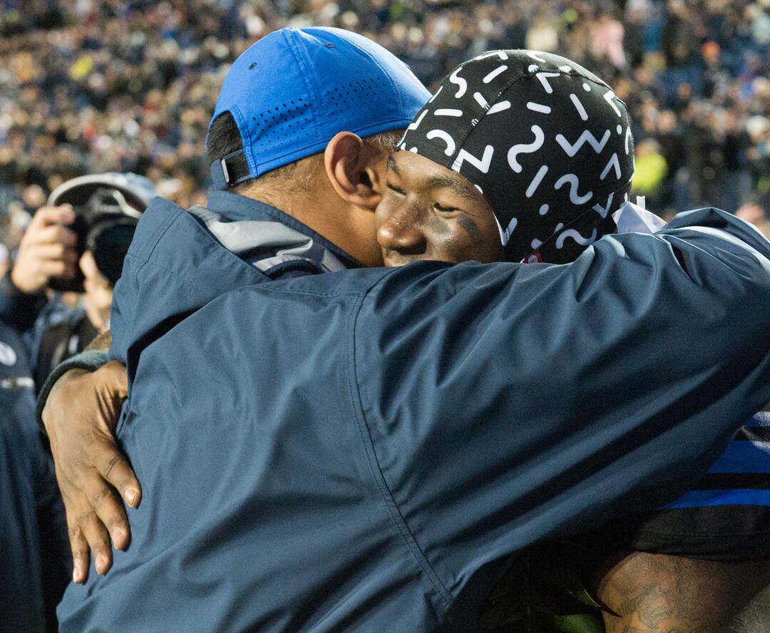 Rick Egan  |  The Salt Lake TribuneBrigham Young Cougars head coach Kalani Sitake hugs running back Jamaal Williams (21) as he is recognized with the seniors, before football action, BYU vs Utah State, at Lavell Edwards Stadium in Provo,  Saturday, November 26, 2016.