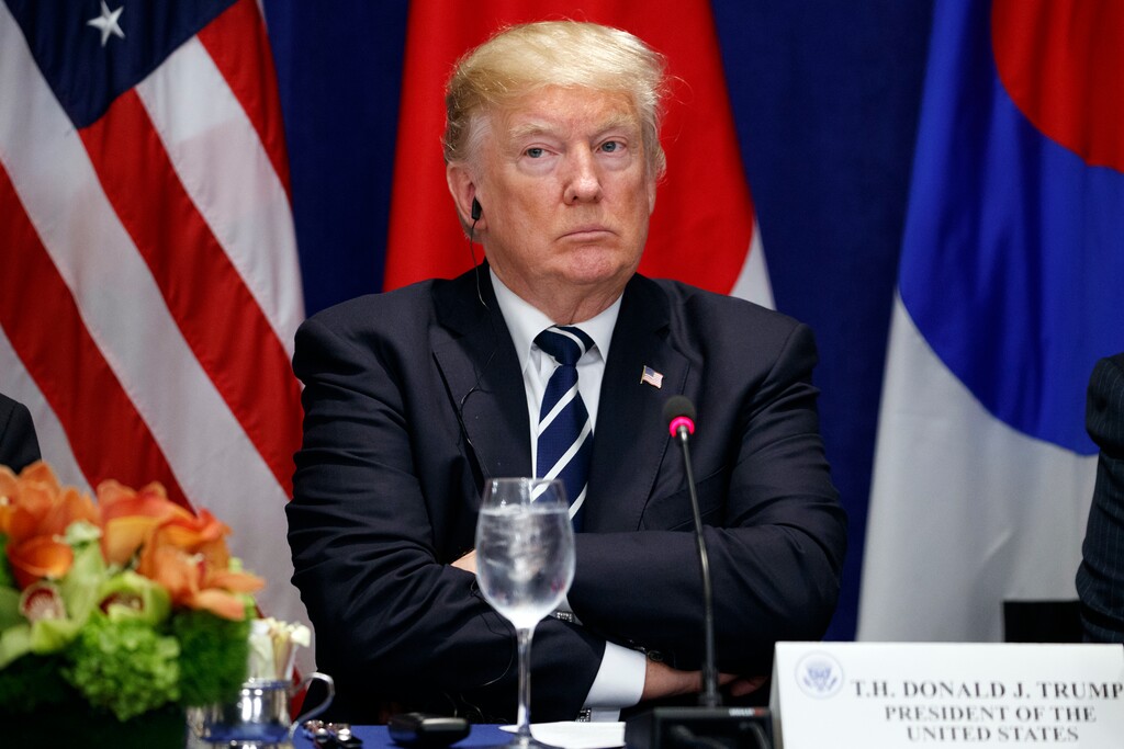 President Donald Trump listens during a luncheon with South Korean President Moon Jae-in and Japanese Prime Minister Shinzo Abe, at the Palace Hotel during the United Nations General Assembly, Thursday, Sept. 21, 2017, in New York. (AP Photo/Evan Vucci)