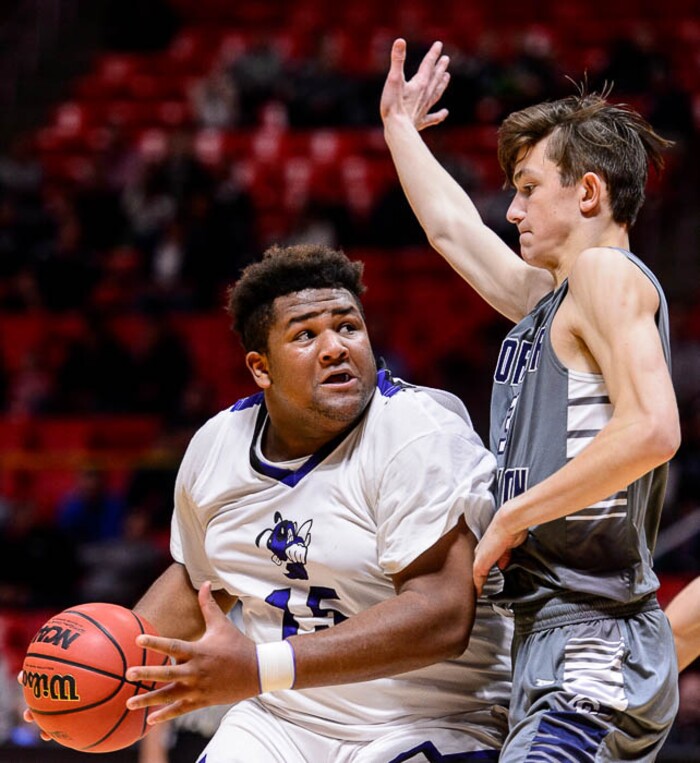(Trent Nelson | The Salt Lake Tribune)  Box Elder vs. Corner Canyon, 5A State high school basketball tournament at the Huntsman Center in Salt Lake City, Wednesday Feb. 28, 2018. Box Elder's Tyson Madson (15) defended by Corner Canyon's Hayden Welling (13).