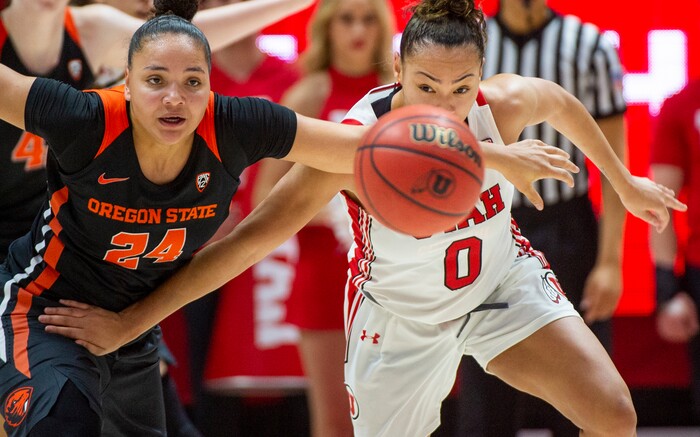 (Rick Egan  |  The Salt Lake Tribune)     Oregon State Beavers guard Destiny Slocum (24) and Utah Utes guard Kiana Moore (0) for after a loose ball, in PAC-12 basketball action between the Utah Utes and the Oregon State Beavers at the Jon M. Huntsman Center, Saturday, Feb. 1, 2020.