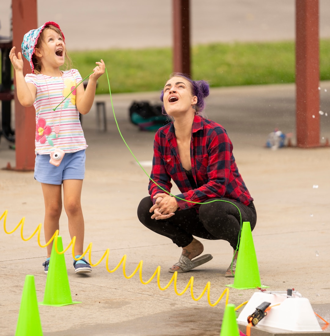 (Rick Egan | The Salt Lake Tribune) Talya Buhler and her mother Katlyn Buhler launch a hand-made rocket at the14th annual Craft Lake City DIY FEST, at the Fair Park, Aug. 13, 2022. 