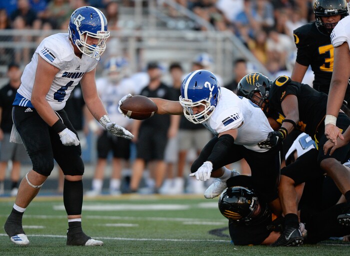 (Francisco Kjolseth  |  The Salt Lake Tribune)  Bingham's Andrew Wimmer pushes past the Orem defense, Thursday, Aug. 16, 2018 in Orem.