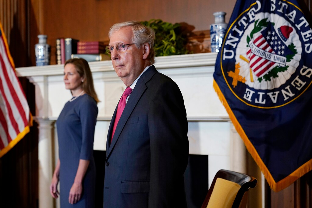 Senate Majority Leader Mitch McConnell of Ky., meets with Supreme Court nominee Judge Amy Coney Barrett on Capitol Hill in Washington, Tuesday, Sept. 29, 2020. (AP Photo/Susan Walsh, POOL)