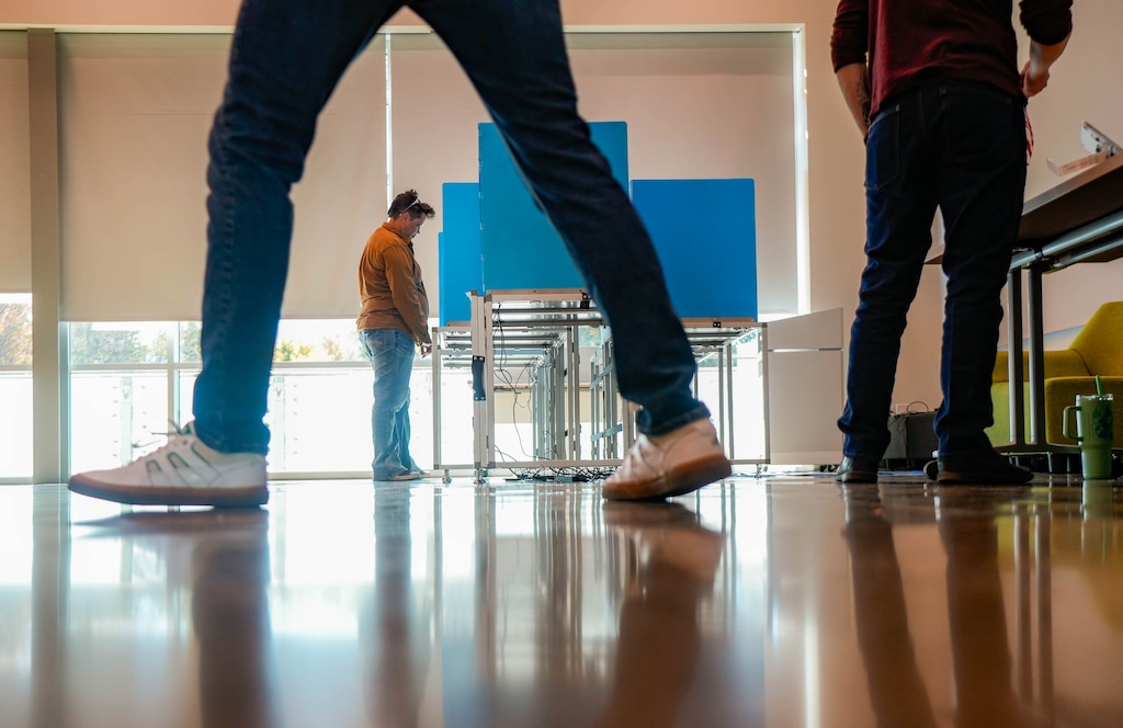 (Francisco Kjolseth | The Salt Lake Tribune) People vote at the Marmalade branch of the Salt Lake City Library on Tuesday, Nov. 4, 2025.