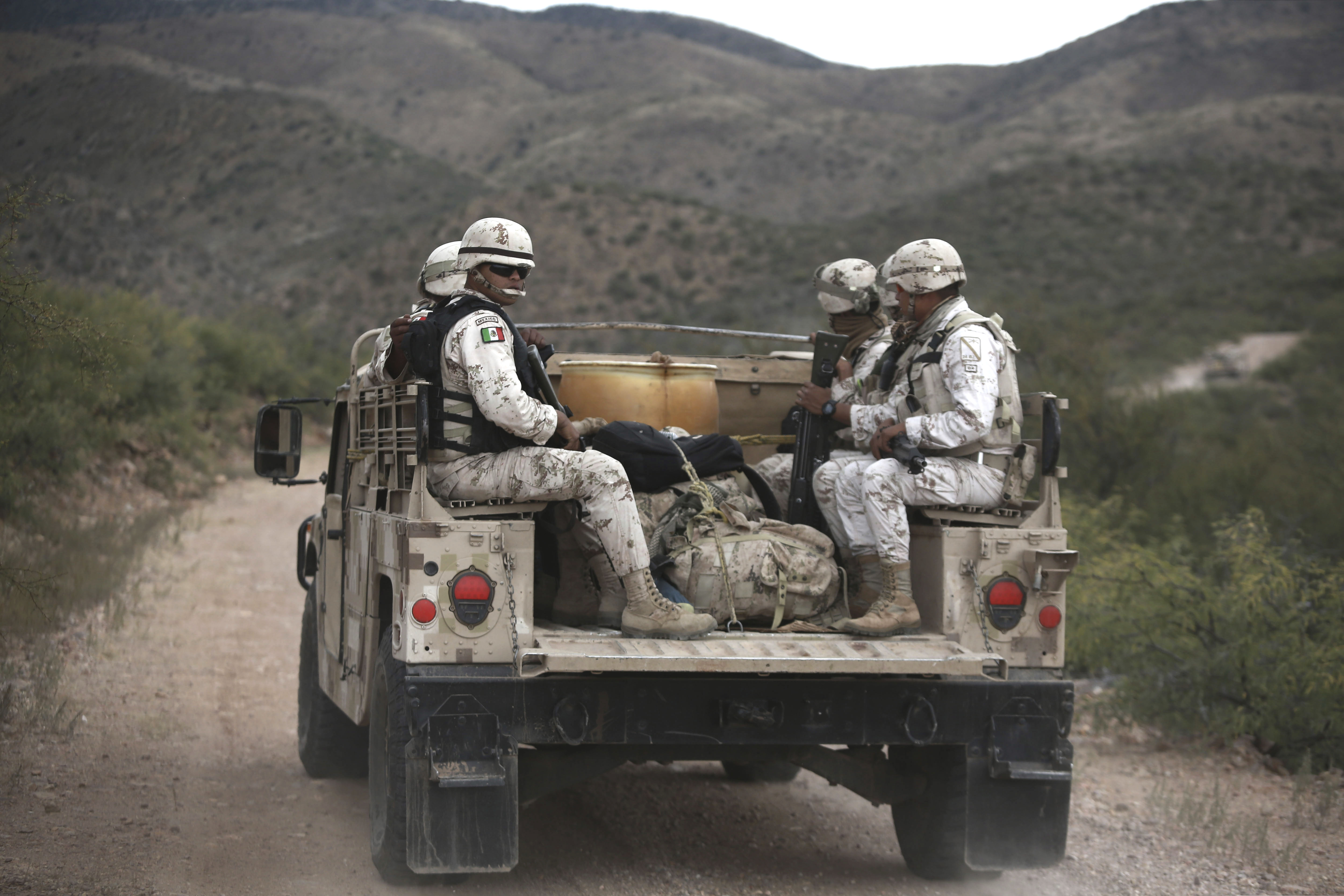 (Christian Chavez | AP) Mexican national guardsmen patrol near Bavispe, at the Sonora-Chihuahua border, Mexico, Wednesday, Nov. 6, 2019. When drug cartel gunmen opened fire on American women and children in northern Mexico on Monday, the Mexican Army, the National Guard and Sonora state police were not there to protect them. It took them about eight hours just to arrive.