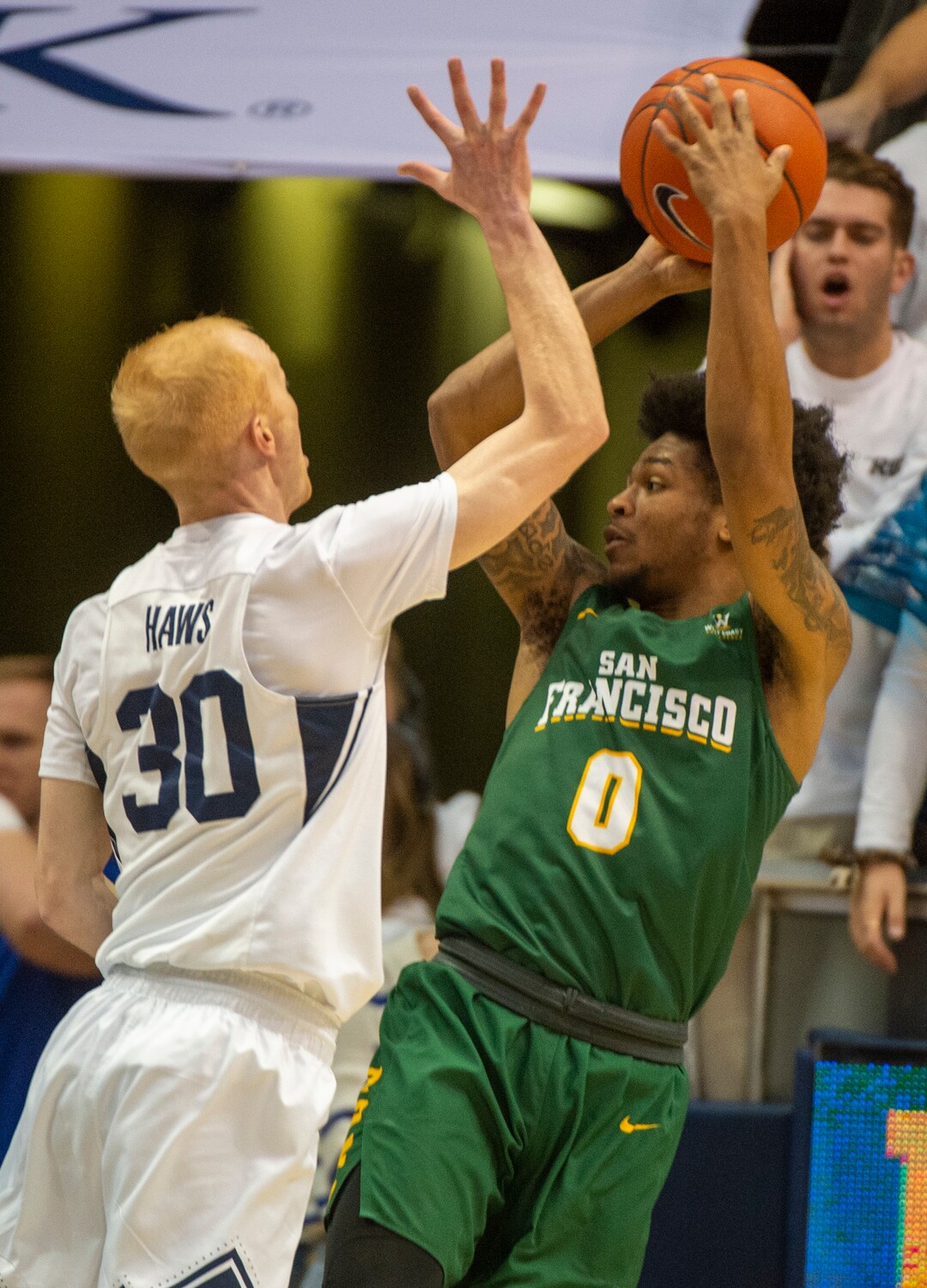 (Rick Egan  |  The Salt Lake Tribune)    San Francisco Dons guard Khalil Shabazz (0)shoots over Brigham Young Cougars guard TJ Haws (30), in WCC basketball acton between the Brigham Young Cougars and the San Francisco Dons, at the Marriott Center, Saturday, Feb. 8, 2020.