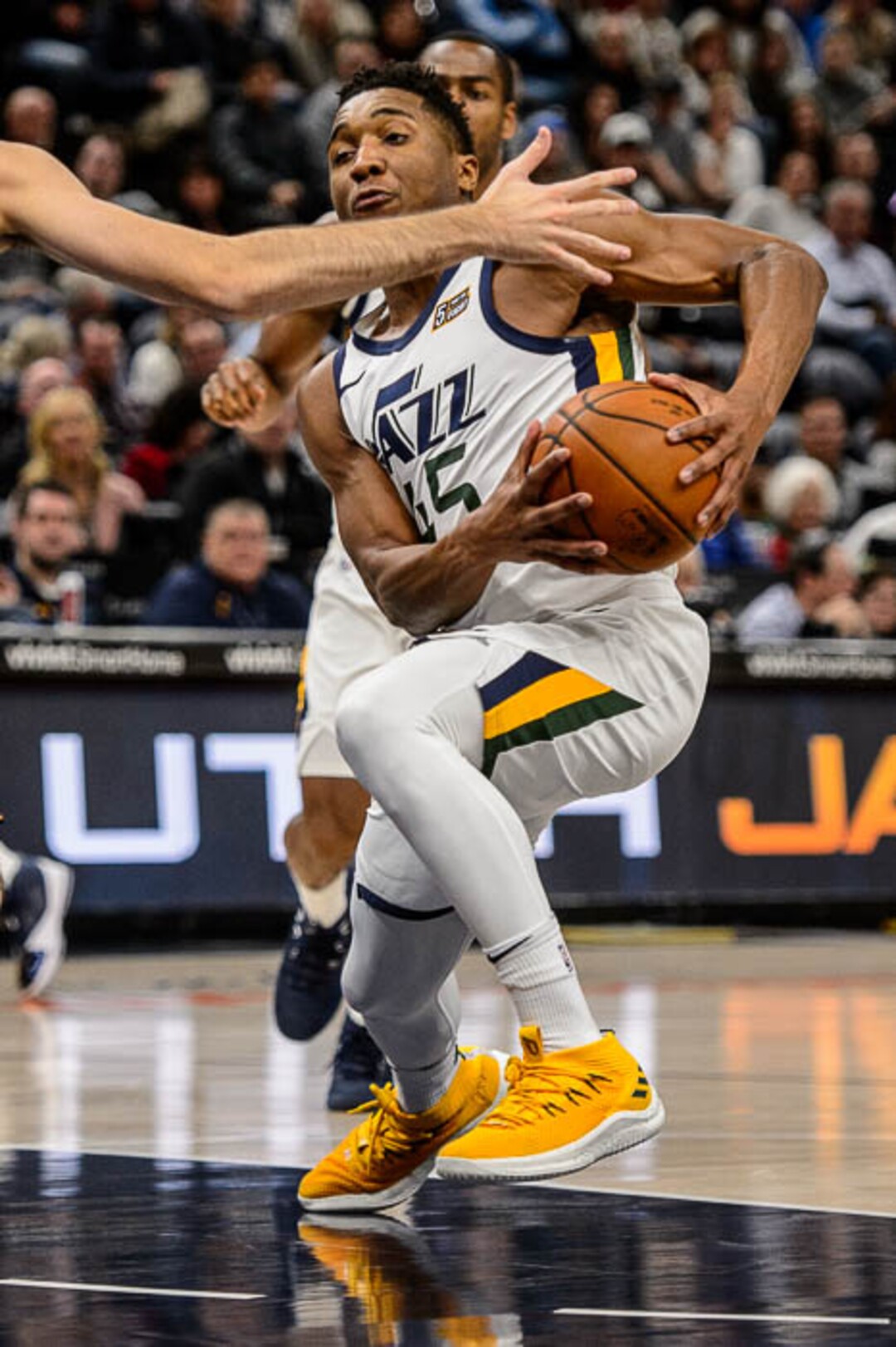 (Trent Nelson | The Salt Lake Tribune)  Utah Jazz guard Donovan Mitchell (45) defended by Oklahoma City Thunder guard Alex Abrines (8) as the Utah Jazz host the Oklahoma City Thunder, NBA basketball in Salt Lake City, Saturday December 23, 2017.