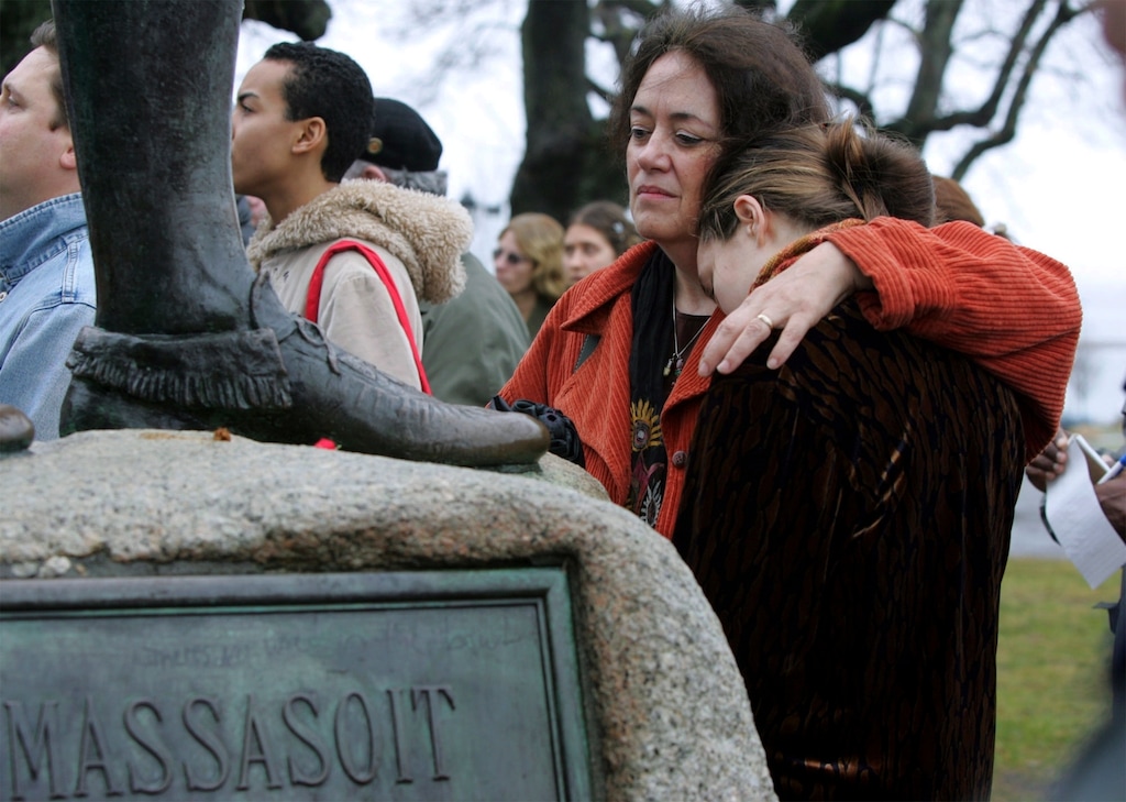 (Chitose Suzuki | AP file photo) In this Nov. 25, 2004 file photo, Native American supporter Deborah Theodore, left, of Belmont, Mass., and her daughter, Sofia Theodore-Pierce stand together by the statue of Massasoit on Cole's Hill in Plymouth, Mass., during the 35th National Day of Mourning. United American Indians of New England held the first National Day of Mourning in 1970, and again plan to gather at noon on Thanksgiving Day, Thursday, Nov. 28, 2019.