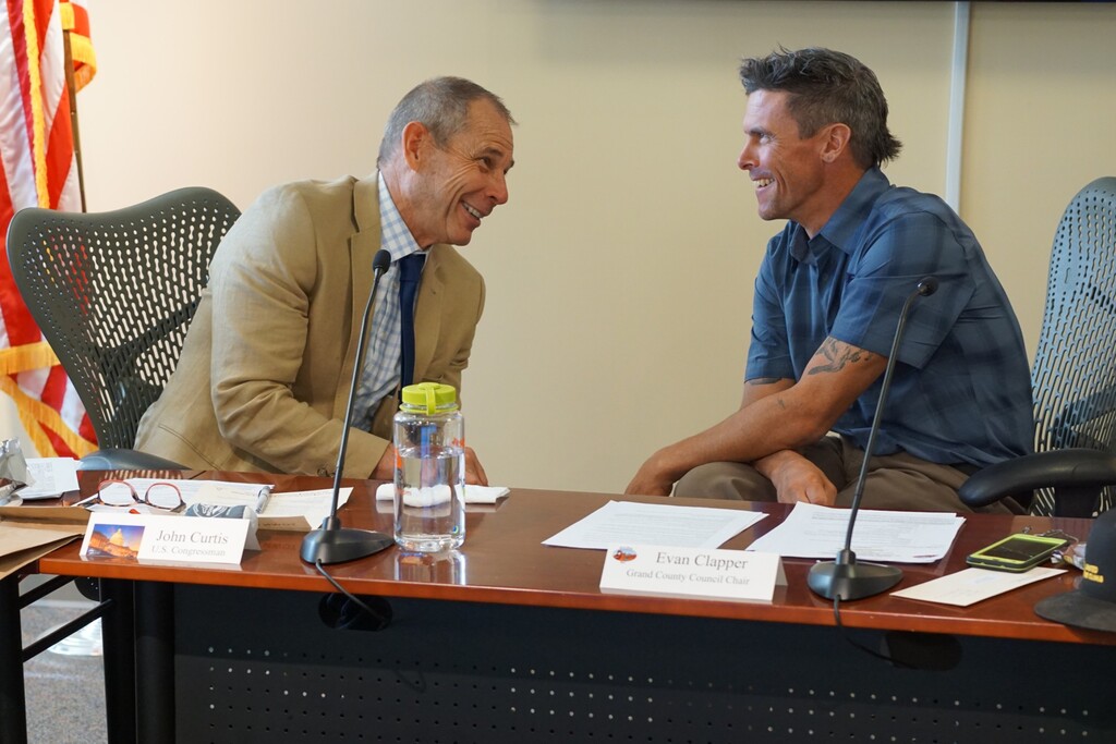 (Zak Podmore | The Salt Lake Tribune) Rep. John Curtis, R-Utah, speaks with Grand County Council Chairman Evan Clapper after a special meeting in Moab on Tuesday, Oct. 8, 2019.
