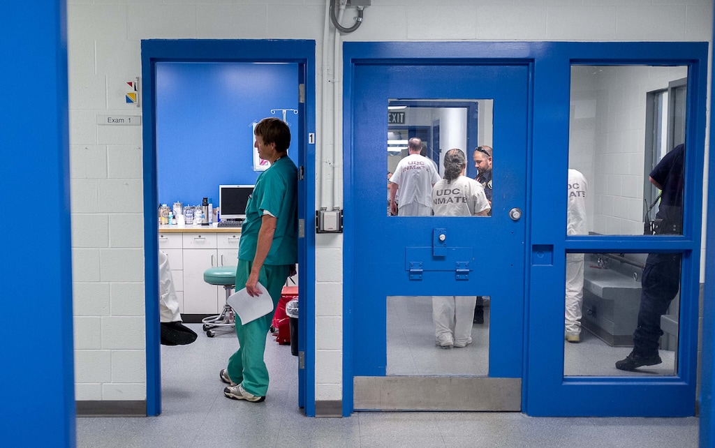 Trent Nelson | The Salt Lake Tribune
Doctor K.C. Tubbs checks on an inmate in an examination room in the infirmary of the Utah State Prison in Draper, Utah Wednesday, August 8, 2012.