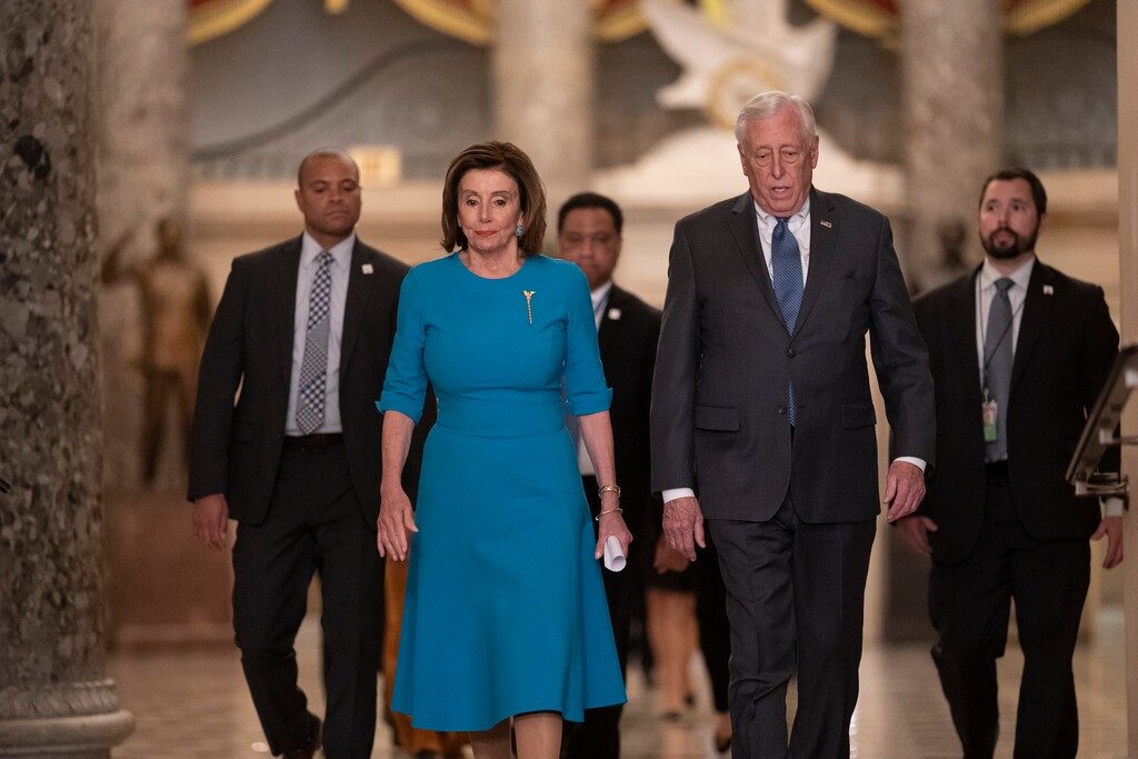 (J. Scott Applewhite | AP file photo) In this March 13, 2020 photo Speaker of the House Nancy Pelosi, D-Calif., and Majority Leader Steny Hoyer, D-Md., arrive to make a statement ahead of a planned late-night vote on the coronavirus aid package deal, at the Capitol in Washington.  Democrats are wrestling over how best to assail Trump for his handling of the coronavirus pandemic and the economy’s shutdown even as the country enters an unpredictable campaign season against the backdrop of the most devastating crisis in decades.
