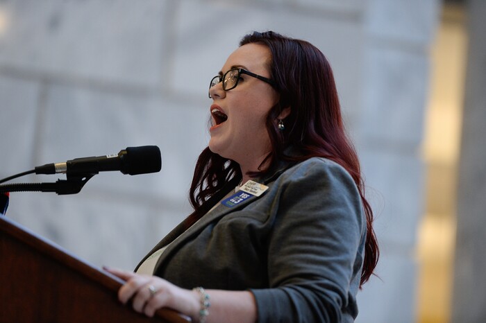 (Francisco Kjolseth  |  The Salt Lake Tribune)  Stacy Stanford, policy analyst at Utah Health Policy Project who was formerly in the coverage gap rallies the crowd of demonstrators filling the Capitol rotunda on Monday, Jan, 28, 2019, on the first day of the Legislative session to rally in support of protecting Proposition 3, the Medicaid Expansion law recently passed by voters.