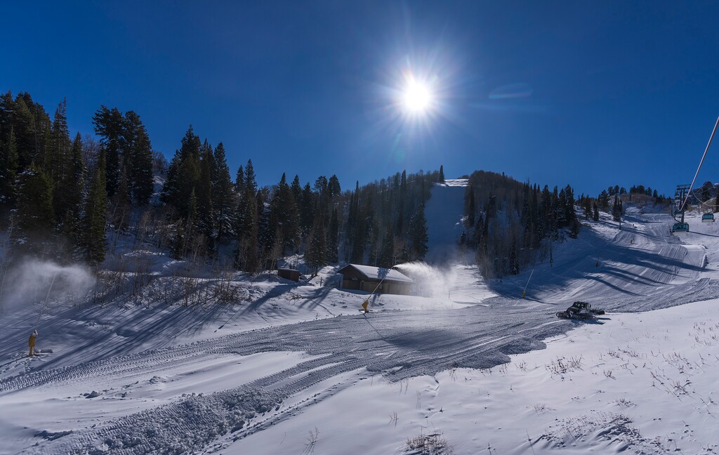 (Leah Hogsten | The Salt Lake Tribune) A snowcat levels snow on the Porcupine Run at Snowbasin Resort, Nov. 21, 2022. 